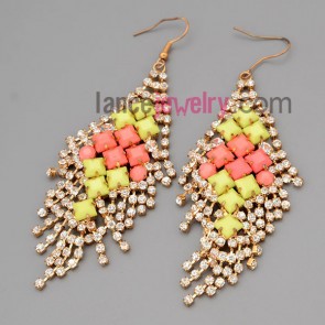 Colorful earrings with claw chain decorate shiny rhinestone and 
multicolor resin
