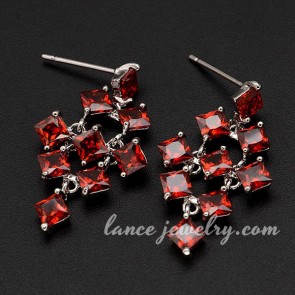 Elegant drop earrings with red cubic zirconia decoration