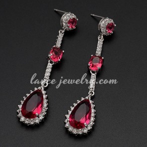 Unique brass alloy earrings with red cubic zirconia decoration