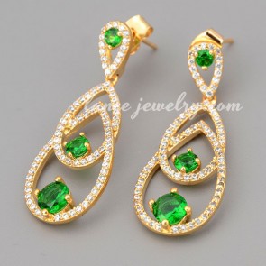 Attractive earrings with green cubic zirconia pendant decorated