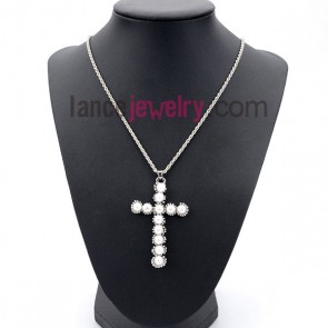 Glittering cross pendant decorated necklace