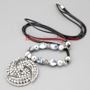 Cute necklace with black hide rope & rhinestone pendant 