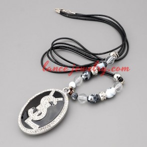 Gorgeous necklace with black hide rope & ellipse pendant 