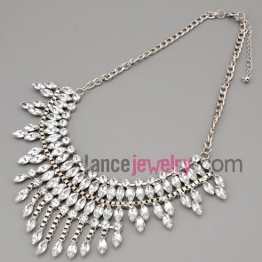 Pure necklace with silver metal chain and brass parts and rhinestone and transparent crystal 