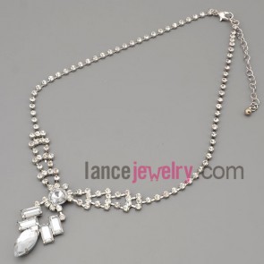Sweet necklace with silver metal chain and brass parts and rhinestone and transparent crystal 