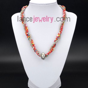 Colorful necklace decorated with measles and metal chain