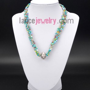 Multicolor necklace decorated with measles and metal chain