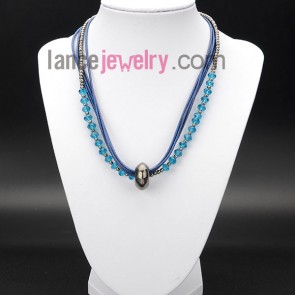 Striking necklace decorated with blue crystal beads and wax rope
