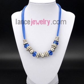 Glittering necklace with blue crystal beads and wax rope


