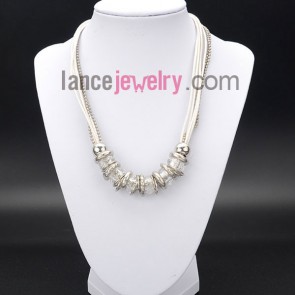 Elegant necklace with shiny crystal beads and white wax rope
