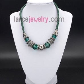 Elegant necklace with ccb beads and green leather rope and crystal beads
