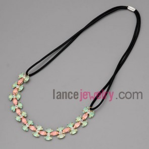 Sweet necklace with black cord and brass and multicolor resin
