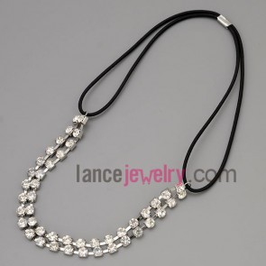 Elegant necklace with black cord and claw chain and rhinestone 
