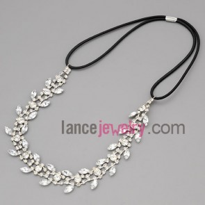 Nice necklace with black cord and claw chain and rhinestone and crystal
