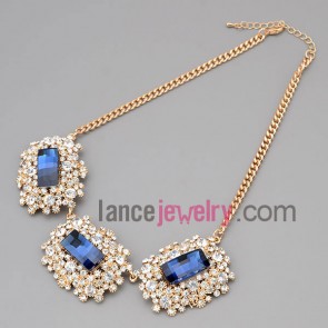 Charming necklace with gold metal chain & alloy parts and shiny rhinestone and deep blue crystal 
