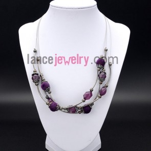 Elegant necklace decorated with purple hair bulb and brass