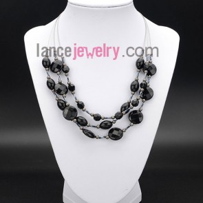 Cool necklace decorated with black acrylic beads 
