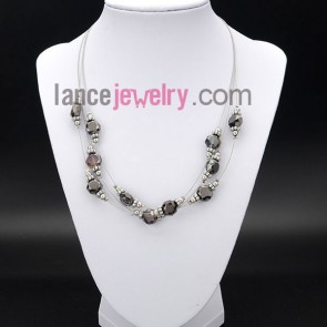 Striking necklace with  shining crystal beads 
