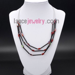 Romantic necklace with shining red
crystal and glass tube 

