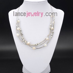 Pure necklace with pearl and crystal beads and  brass
