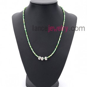Bright necklace with many small size
measles in multicolor and alloy rings

