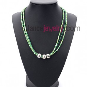 Bright necklace with many small size
measles in multicolor and alloy rings
