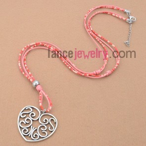 Sweet necklace with multicolor measles and heart pendant 