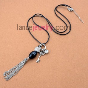 Cool necklace with wax rope decorated
ring with different pendant and ceramic beads