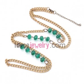 Elegant necklace with green crystal beads and golden chain 
