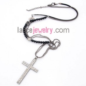 Special necklace with black beads and 
cross pendant decoreted rhinstone
