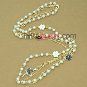 Multilayered imitation pearl necklace with dancing girl charm