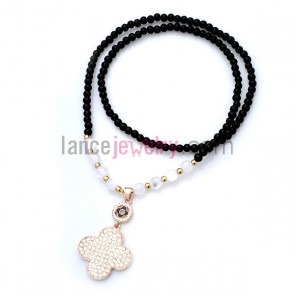 Ceramic bead strand rhinetone clover pendant necklace