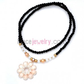 Cat eye ornate flower pendant  ceramic bead strand necklace