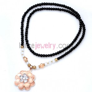 Cat eye ornate flower pendant  ceramic bead strand necklace