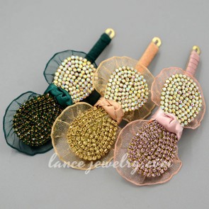 Charming hair clip with colorized rhinestone decoration