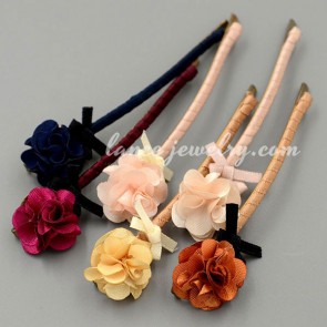 Fashion hair clip decorated with a lovely fabric flower