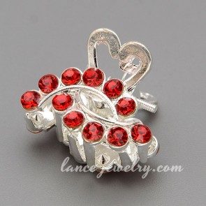 Lovely hair claw with red rhinestone decoration