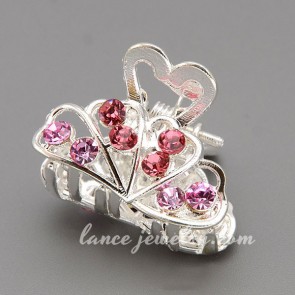 Trendy hair claw decorated with rhodium plating