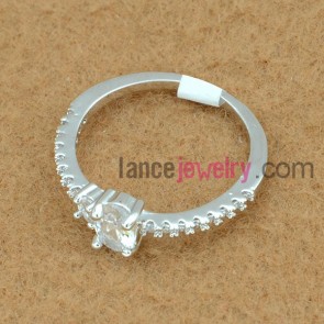 Traditional brass ring decorated with cubic zirconia  