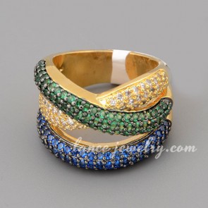 Colorful ring with many shiny multicolor cubic zirconia in the special shape