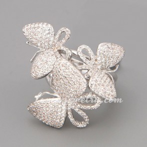 Attractive ring with many shiny cubic zirconia in the flying butterflies shape 