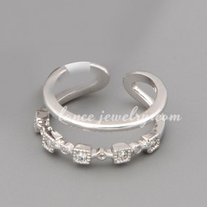 Nice ring with many shiny cubic zirconia in the special shape 