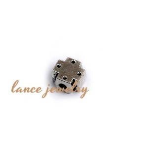 Zinc alloy pendant,a 7mm square with two big holes in the two sides and 4 circles on the each face