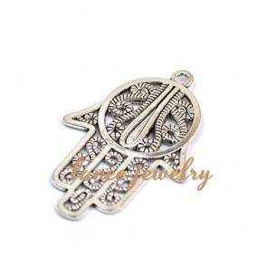 Zinc alloy pendant, a 59mm long pendant with flower patterns and air core