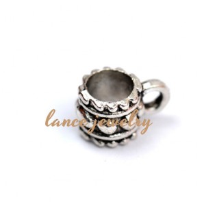 Zinc alloy pendant, a 6mm high pendant, a cup shaped with small beads printed on the body 