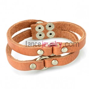 Cute bracelet with orange  leather decorated snap fastener 
