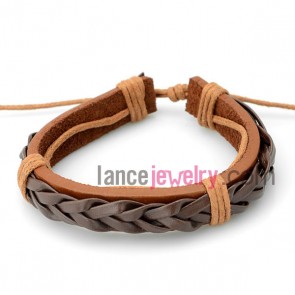 Trendy bracelet with brown  leather decorated bright orange
rubber
