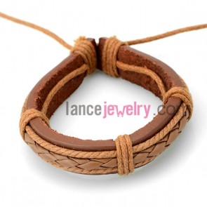 Fashion bracelet with brown  leather decorated bright orange
rubber
