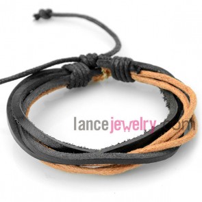 Trendy bracelet decorated with black leather wrapped around   orange rubber

