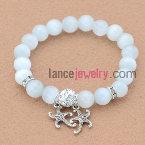 Hot rhinestone and stone beads bracelet with fashion alloy starfish pendants.